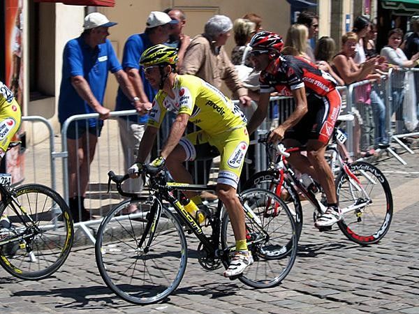 Jos&eacute; Vicente Garcia (Caisse d'Epargne) is the last guy leaving the start town.