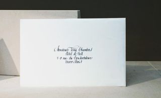 White card with black print