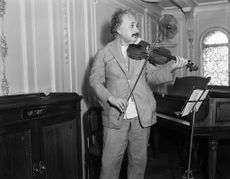 Professor Albert Einstein playing his violin