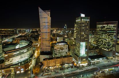 Warsaw Tower in Poland's skyline at night