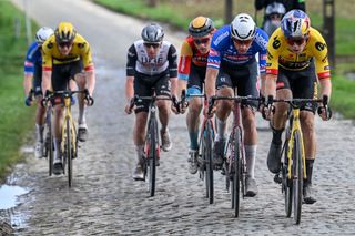 Belgian Wout van Aert of Team JumboVisma and Dutch Mathieu van der Poel of AlpecinDeceuninck pictured in action during the E3 Saxo Bank Classic one day cycling race 2041km from and to Harelbeke on March 24 2023 Photo by DAVID PINTENS various sources AFP Belgium OUT Photo by DAVID PINTENSPOOLAFP via Getty Images