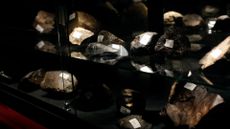 Collection of various gems and meteorites.