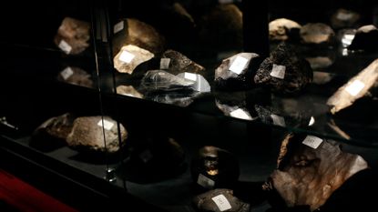 Collection of various gems and meteorites.