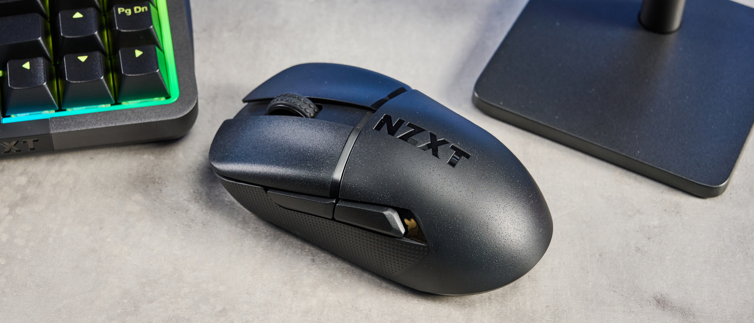 A black NZXT Lift Elite Wireless gaming mouse