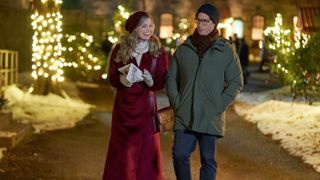 Brooke D'Orsay, Will Kemp walk together on a snowy path in A Not So Royal Christmas