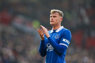 Everton defender Jarrad Branthwaite applauds the fans after a game against Manchester United at Old Trafford in March 2024.