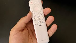 Image shows the Samsung M8 Smart Monitor remote control.