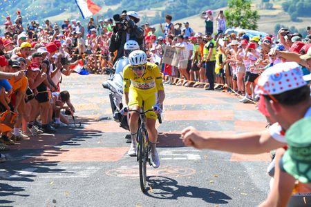 LE LIORAN, FRANCE - JULY 14: Tadej Pogacar of Slovenia and UAE Team Emirates - XRG - Yellow Leader Jersey competes in the breakaway while fans cheers during the 113th Tour de France 2026, Stage 10 a 166.6km stage from Aurillac to Le Lioran 1240m / #UCIWT / on July 14, 2026 in Le Lioran, France. (Photo by Dario Belingheri/Getty Images)