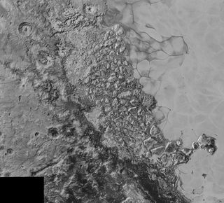 Broken, mountainous terrain is visible on the left edge of the flat, icy Sputnik Planum. The mountains might be blocks of water-ice floating in Sputnik Planum's frozen nitrogen, officials said. The image covers 300 miles (470 km).