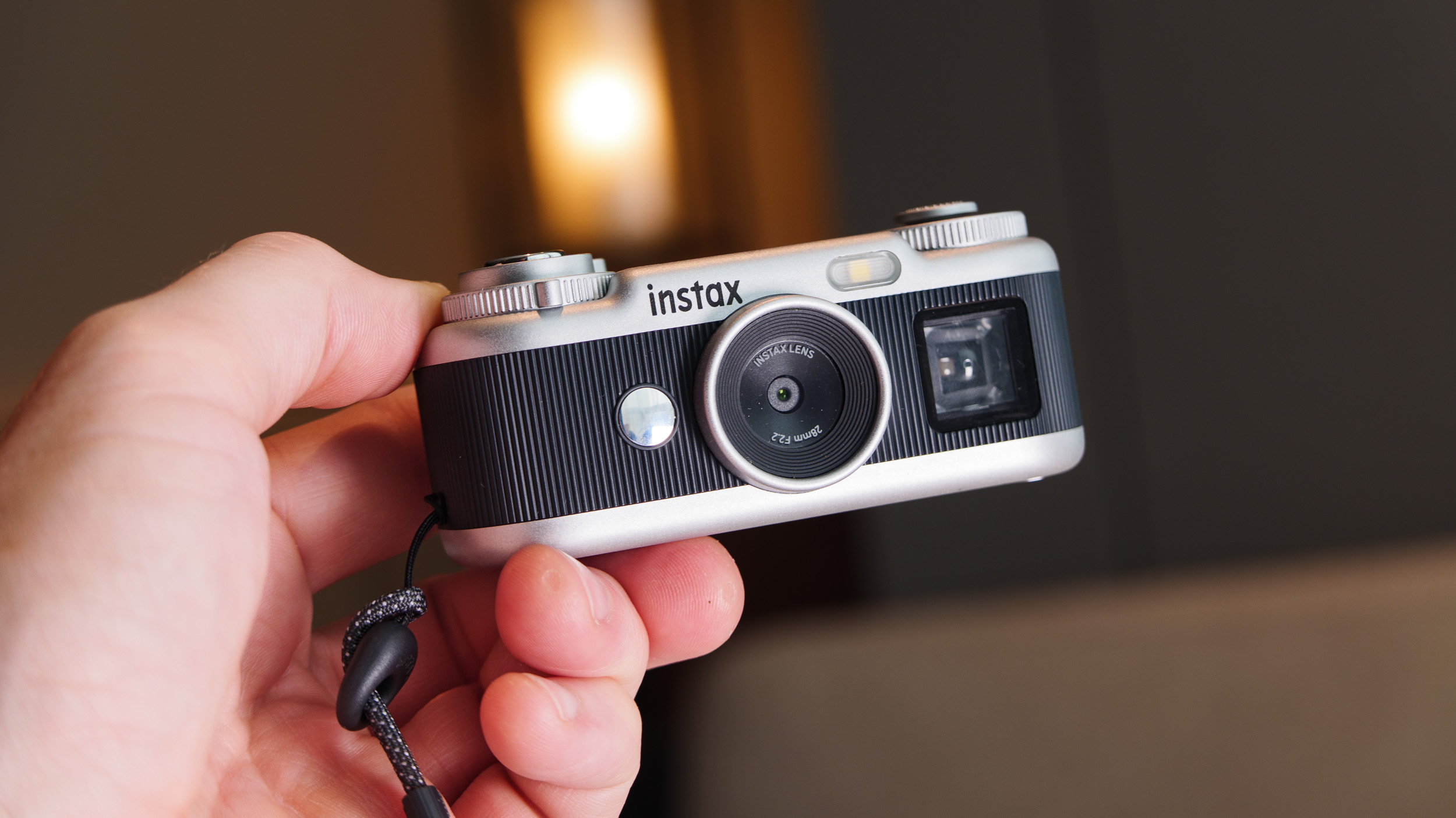 Fujifilm Instax Pal 2 digital camera in user's hand