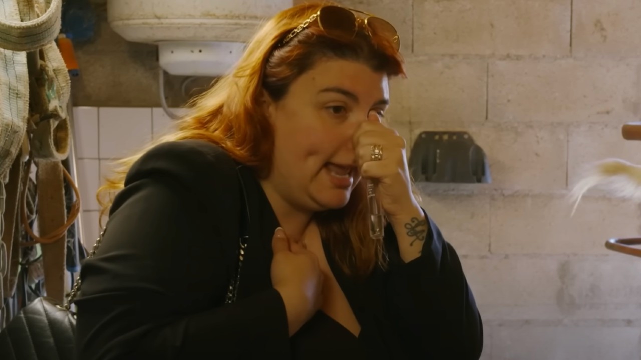 Manon holding her nose