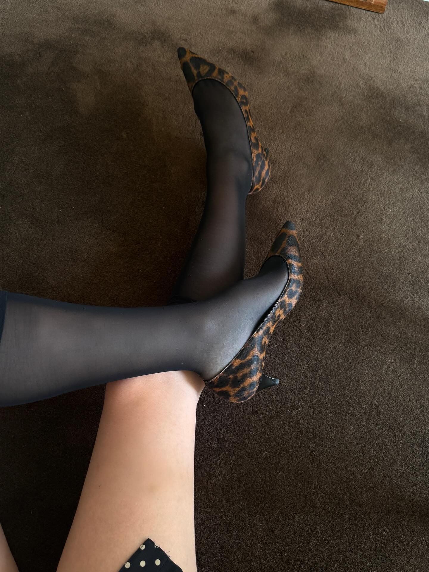 Influencer wearing leopard kitten heels