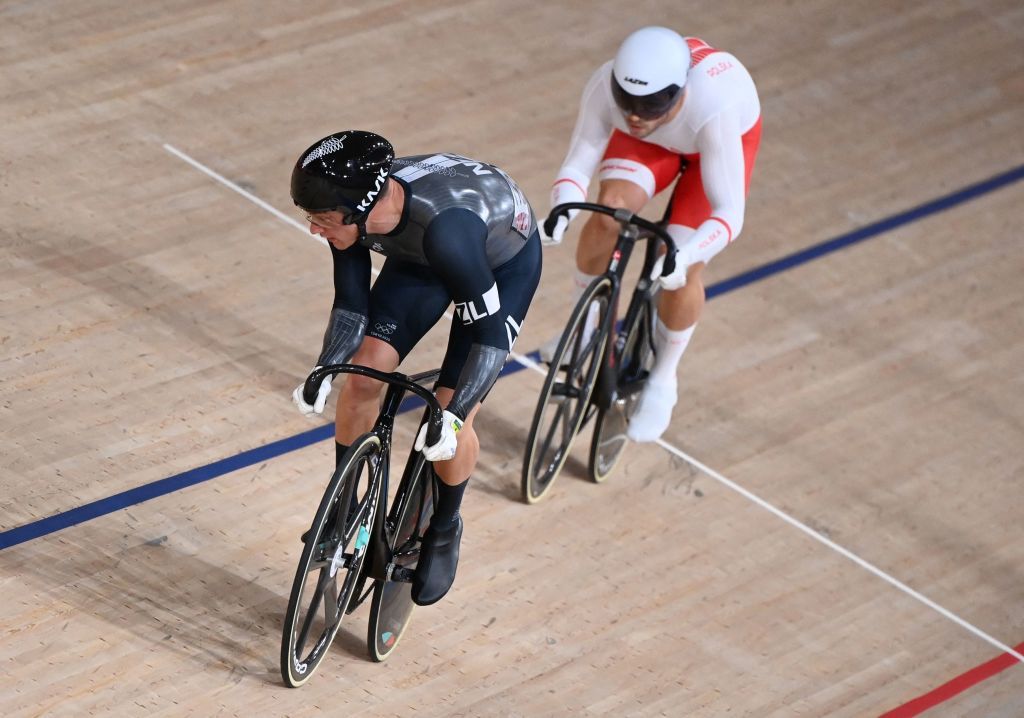 New Zealands Sam Webster front and Polands Mateusz Rudyk compete in a heat of the mens track cycling sprint 132 finals during the Tokyo 2020 Olympic Games at Izu Velodrome in Izu Japan on August 4 2021 Photo by Peter PARKS AFP Photo by PETER PARKSAFP via Getty Images