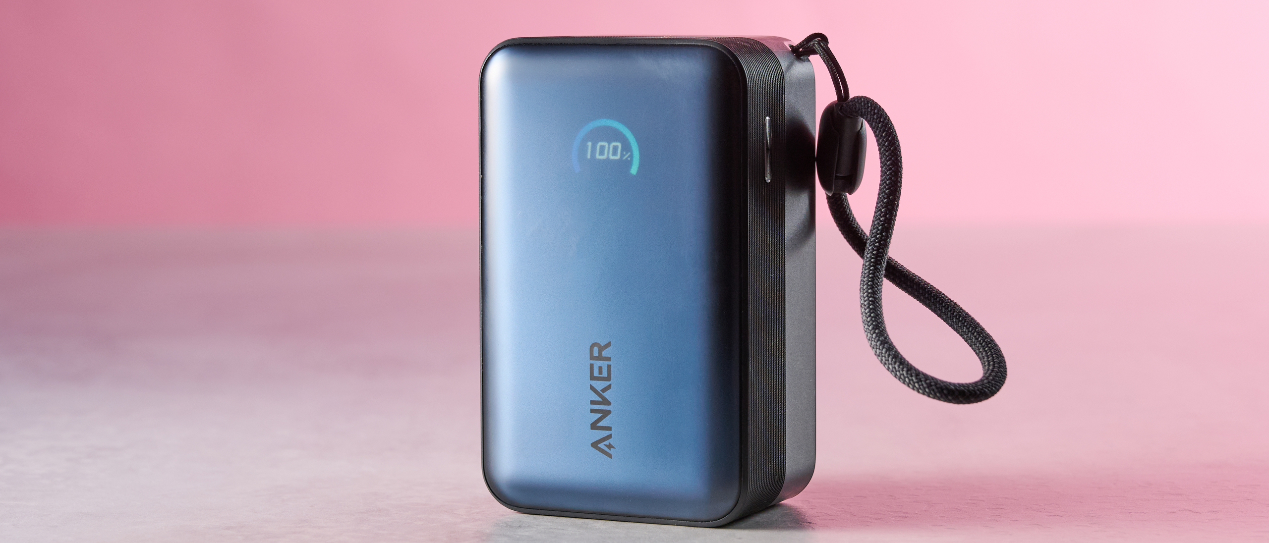 Anker Nano Power Bank 10K 45W Built-In Retractable USB-C Cable against pink background