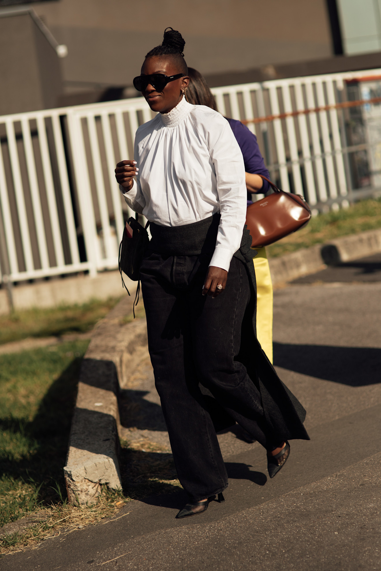 Nikki Ogunnaike wearing a high-neck top and trousers