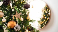 christmas tree with gold ornaments