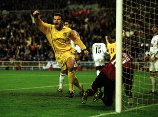 Mark Viduka of Leeds celebrates after scoring the second goal during the Real Madrid v Leeds United UEFA Champions League Group D match at the Bernabeu Stadium in Madrid, Spain.
