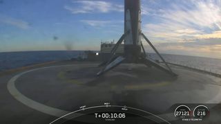 SpaceX's Falcon 9 rocket first stage booster stands atop the drone ship Just Read The Instructions after making its ninth launch and landing on Nov. 13, 2021.