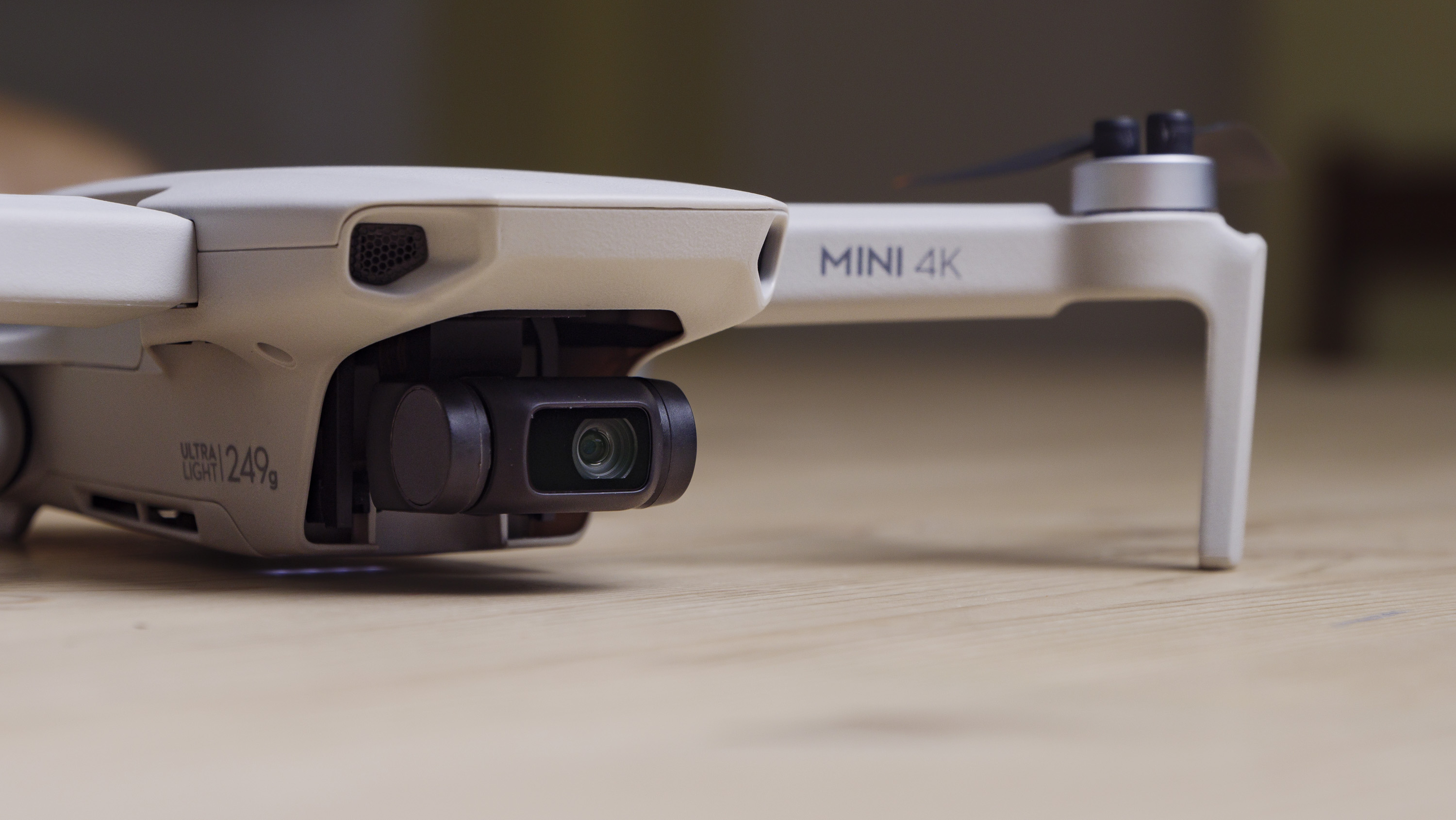 DJI Mini 4K beginner drone on a wooden table