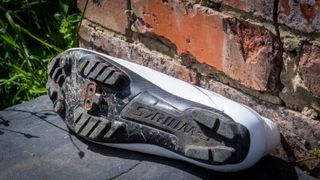 The sole of an S-Works Recon shoe, showing the recessed SPD cleat