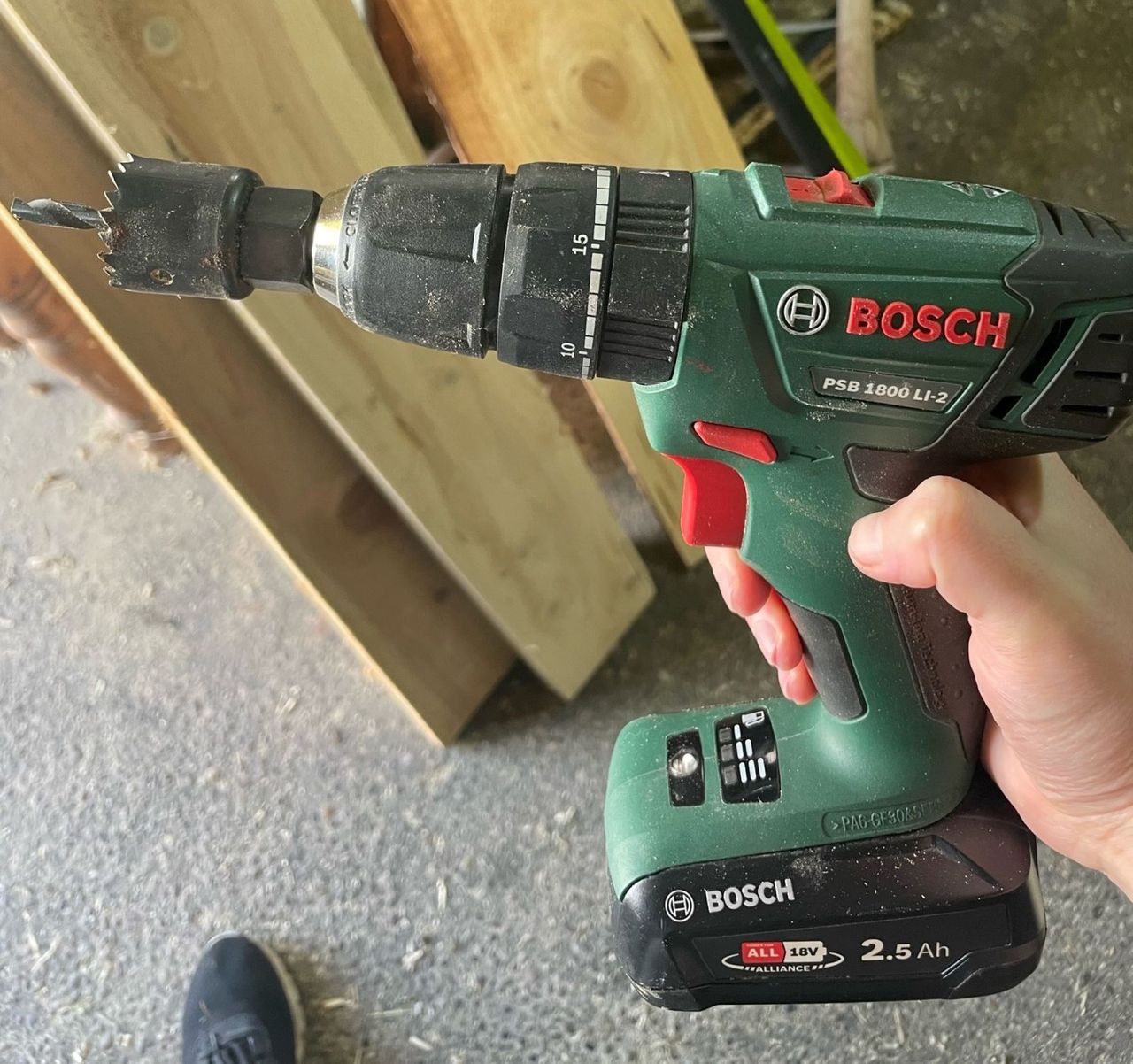 A Bosch drill with a circle cutting attachment