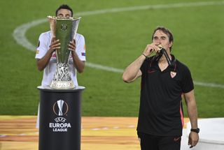 Sevilla’s head coach Julen Lopetegui (right) celebrates victory