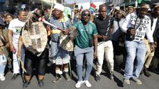 Anti-immigration protesters march against migrants in South Africa. 