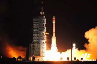 China's Tiangong-2 space laboratory for astronauts launches into space atop a Long March 2F rocket in this view from Jiuquan Satellite Launch Center in northwest China on Sept. 15, 2016.