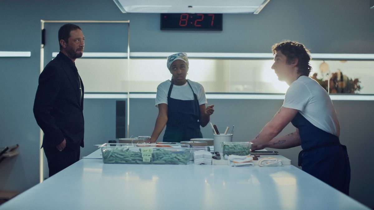 Richie (Ebon Moss-Bachrach), Sydney (Ayo Edebiri) and Carmy (Jeremy Allen White) discuss their restaurant on The Bear