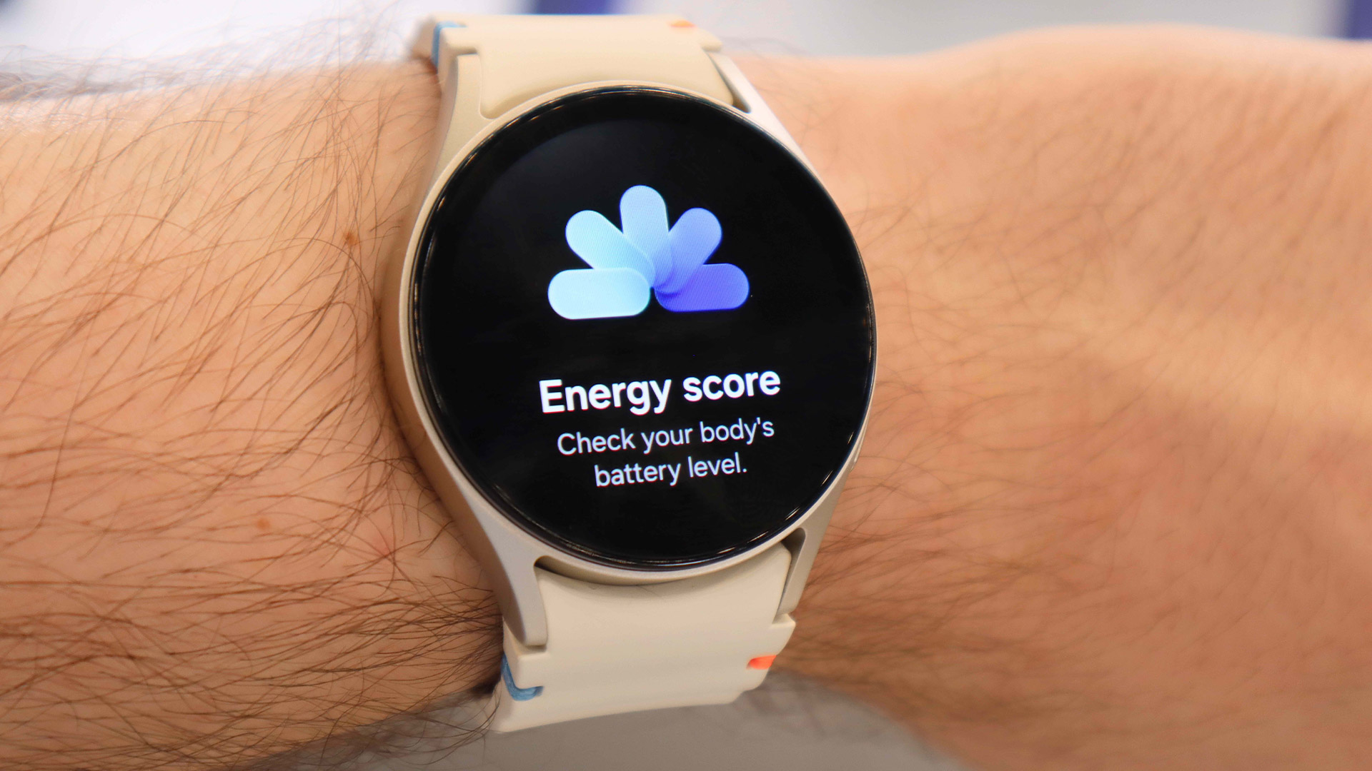 Samsung Galaxy Watch 7 on a wrist with the Energy Score feature