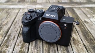 The Sony A7R V on a table without a lens