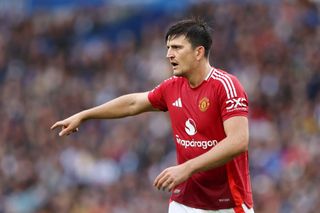 BRIGHTON, ENGLAND - AUGUST 24: Harry Maguire of Manchester United gestures during the Premier League match between Brighton & Hove Albion FC and Manchester United FC at Amex Stadium on August 24, 2024 in Brighton, England. (Photo by Eddie Keogh/Getty Images)