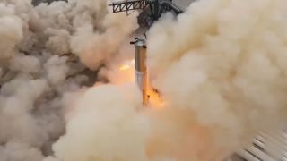 SpaceX's Booster 7 Super Heavy prototype ignites 31 of its 33 engines during a static fire test at the company's Starbase site on Feb. 9, 2023.