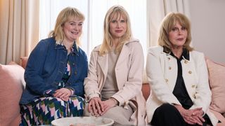 Philippa Dunne as Anne, Lucy Punch as Amanda, and Dame Joanna Lumley as Felicity sit together on a sofa in Amandaland.