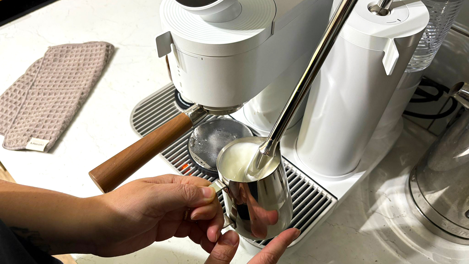 Steaming milk in the Meraki espresso machine