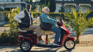 Richard Roundtree and June Squibb riding on a scooter through los angeles in Thelma