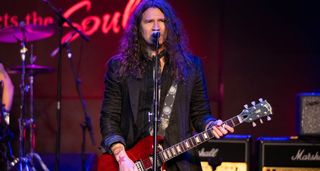 Phil X of the Drills and Bon Jovi performs at a Leslie West Tribute concert and plays a Cherry Red Gibson SG.