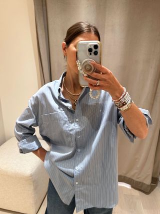 Fashion editor Judith Jones in a blue striped button-down shirt.