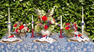 Jubilee decorations tablecloth and flower arrangements to dress a garden party table