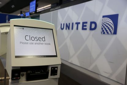 A closed United Airlines kiosk.