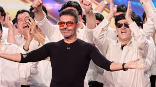 Simon Cowell poses with a choir of Simon Cowell impersonators during episode 4 of BGT 2024