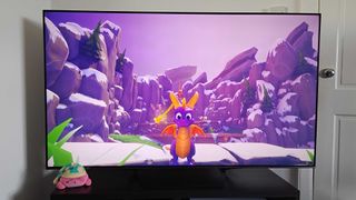 Hisense U7N with Spyro the Dragon on screen with snowy backdrop