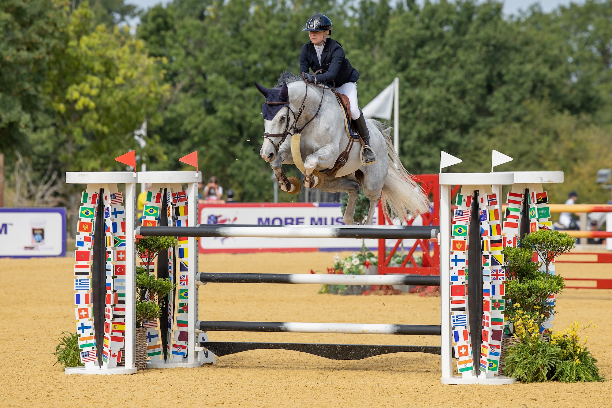 Izabella Rogers and Diagolda PS clear an oxer
