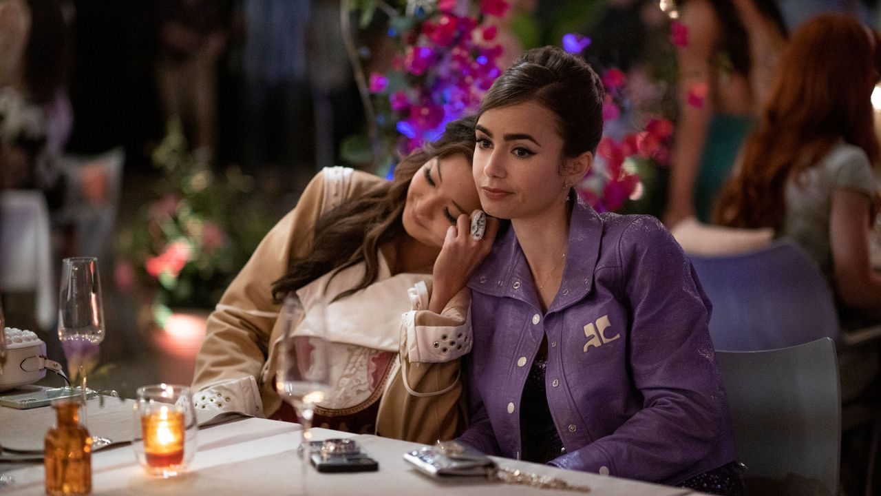 Emily in Paris. (L to R) Ashley Park as Mindy, Lily Collins as Emily in episode 202 of Emily in Paris.