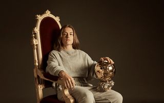 Spain at Women's Euro 2022: Alexia Putellas of FC Barcelona poses for a portrait with the La Liga, Women Champion League, Copa de la Reina, UEFA Women's Player of the Year and Ballon d'Or trophie during a UEFA Media day on March 09, 2022 in Barcelona, Spain.