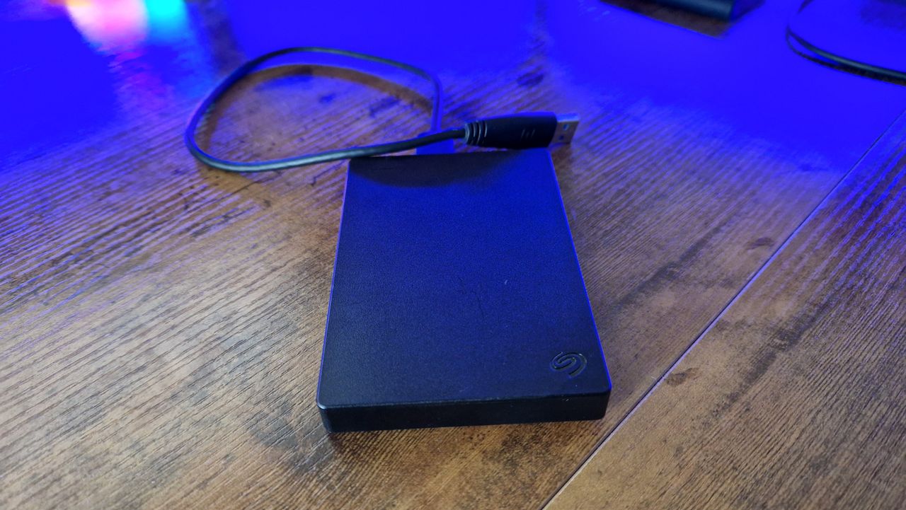 Seagate Portable Drive HDD on a gaming desk