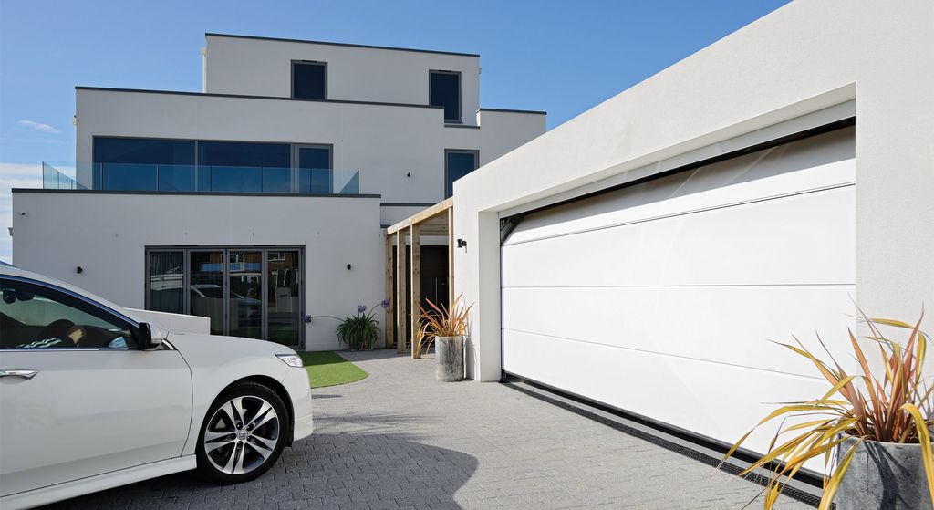 Sectional Garage Doors Costs, Material Choices and Installation Tips