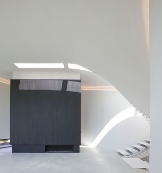 Concrete curves of Office O Architects' Villa MQ | Wallpaper