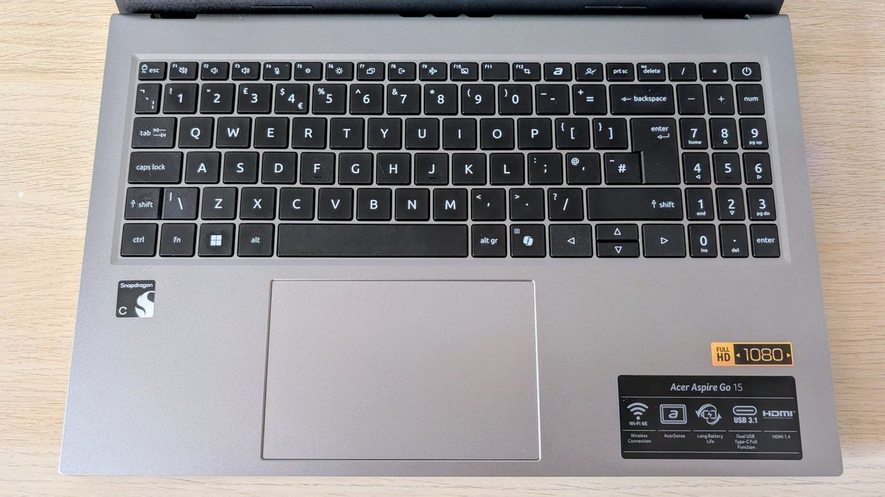 The Acer Aspire Go on the ITPro background