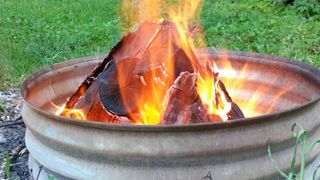 wood burning on a DIY fire pit